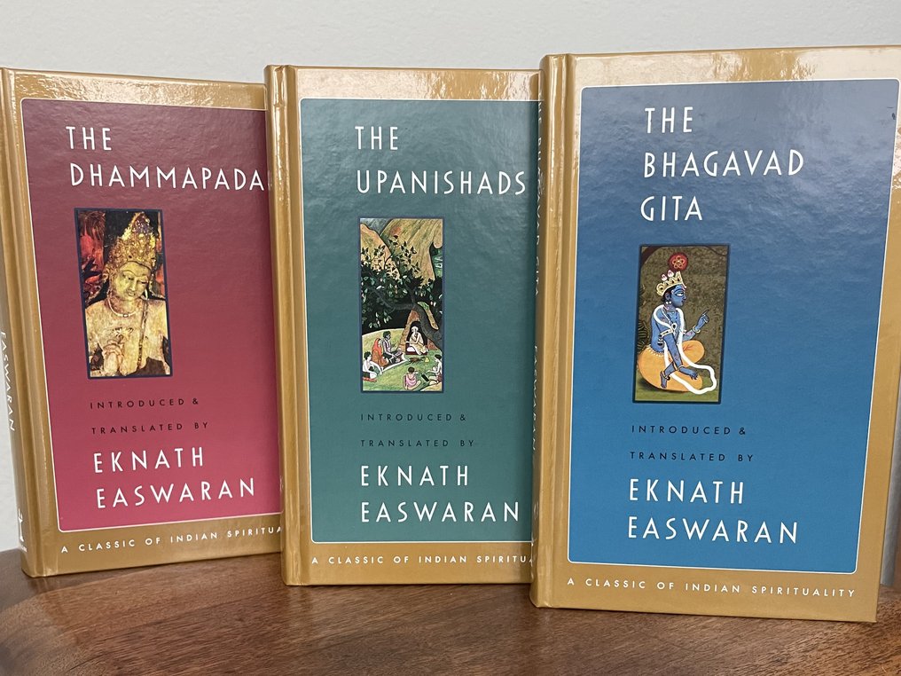 Three books: Eawaran's translations The Dhammapada, The Upanishads, and The Bhagavad Gita